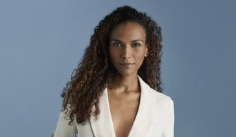 A woman with beautiful face demonstrates the effect face fillers that reduce wrinkles, lift the face and add volume